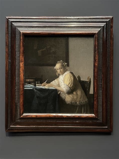 Schrijvend meisje/Schrijvende vrouw in het geel (1666)